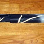 An after picture of a duracoated Remington 870 shotgun